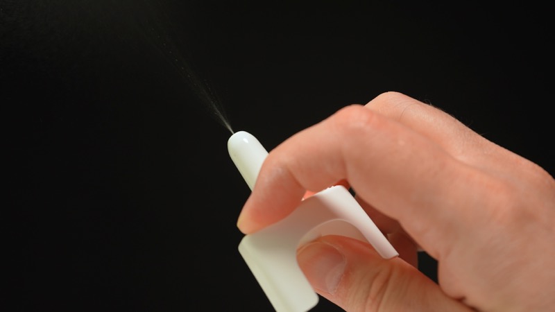 Naloxone nasal spray from emergency overdose kit bag used for recovery from narcotic opioid medications or street drugs overdose.